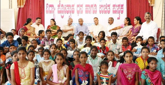 Kundar family donates school books and scholarships to 150 students