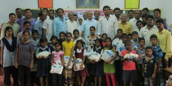 Mangaluru: 40th Block Congress distributes notebooks to 150 poor students