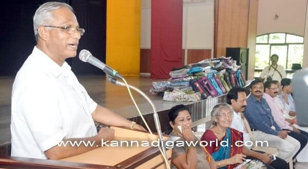KORWA distributes school bags and books to needy students.